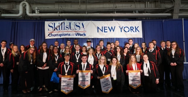 Bohlen Technical Center students pose with first place banners 