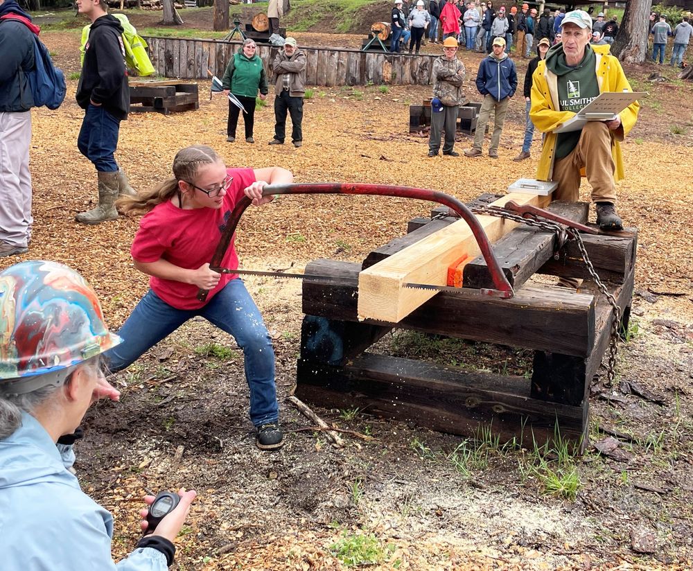 Shyainne Davoy competes in the bow saw competition 