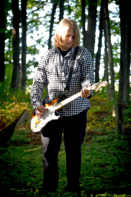 Marshall Kristoff playing guitar