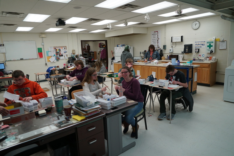 Students in the Transiitions class preparing mailings 
