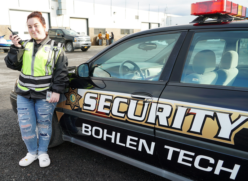 Hayley in front of BTC patrol car